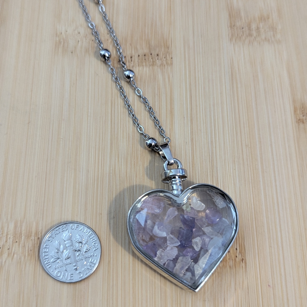Heart-Shaped Silver Necklace with Purple Gemstones